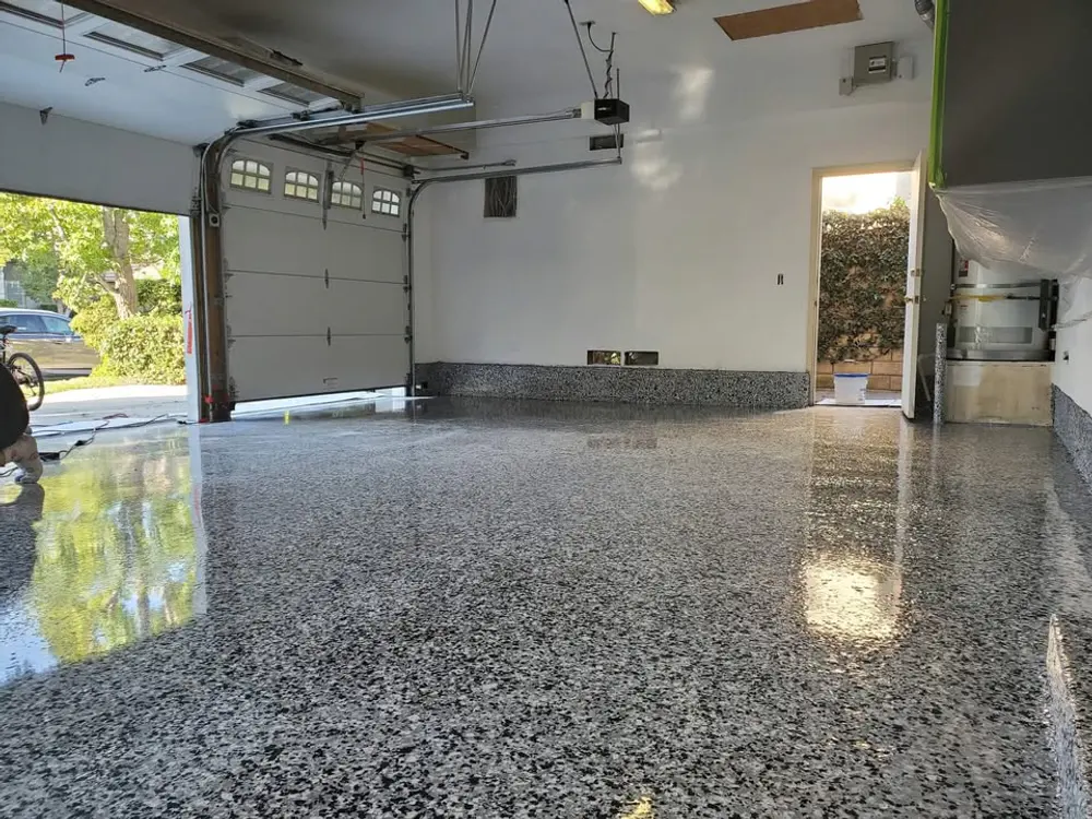 Gray flake floor coating inside a residential garage